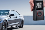 a tire inflator near a car