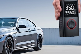 a tire inflator near a car