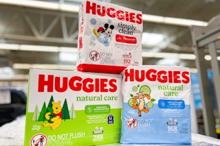 three boxes of Huggies baby wipes stacked on a box at Walmart