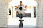 Lifestyle image of the Suproot Telescopic Stool of 2 people balancing on top