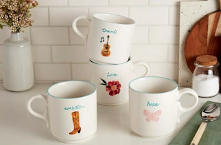 dolly parton mugs on a counter
