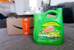 Gain laundry detergent next to Prime box