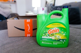 Gain laundry detergent next to Prime box