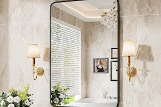 a bathroom mirror in a bathroom