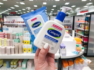 hand holding cetaphil products