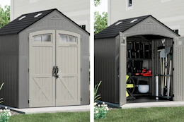 gray storage shed with the doors closed and open