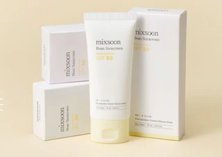 a tube of sunscreen in front of boxes