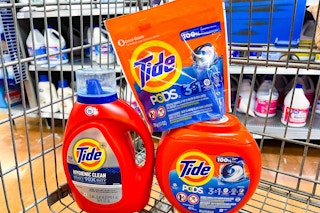 tide liquid detergent and tide pods together in a shopping cart