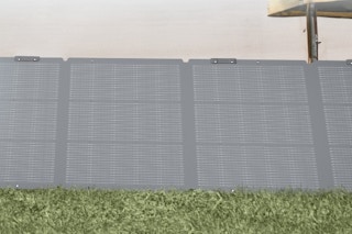 a solar panel on grass