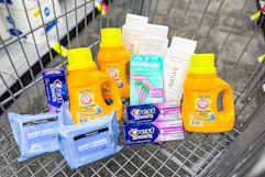 neutrogena makeup wipes, crest toothpaste, skintimate razors, native body wash, and arm & hammer detergent in a cart
