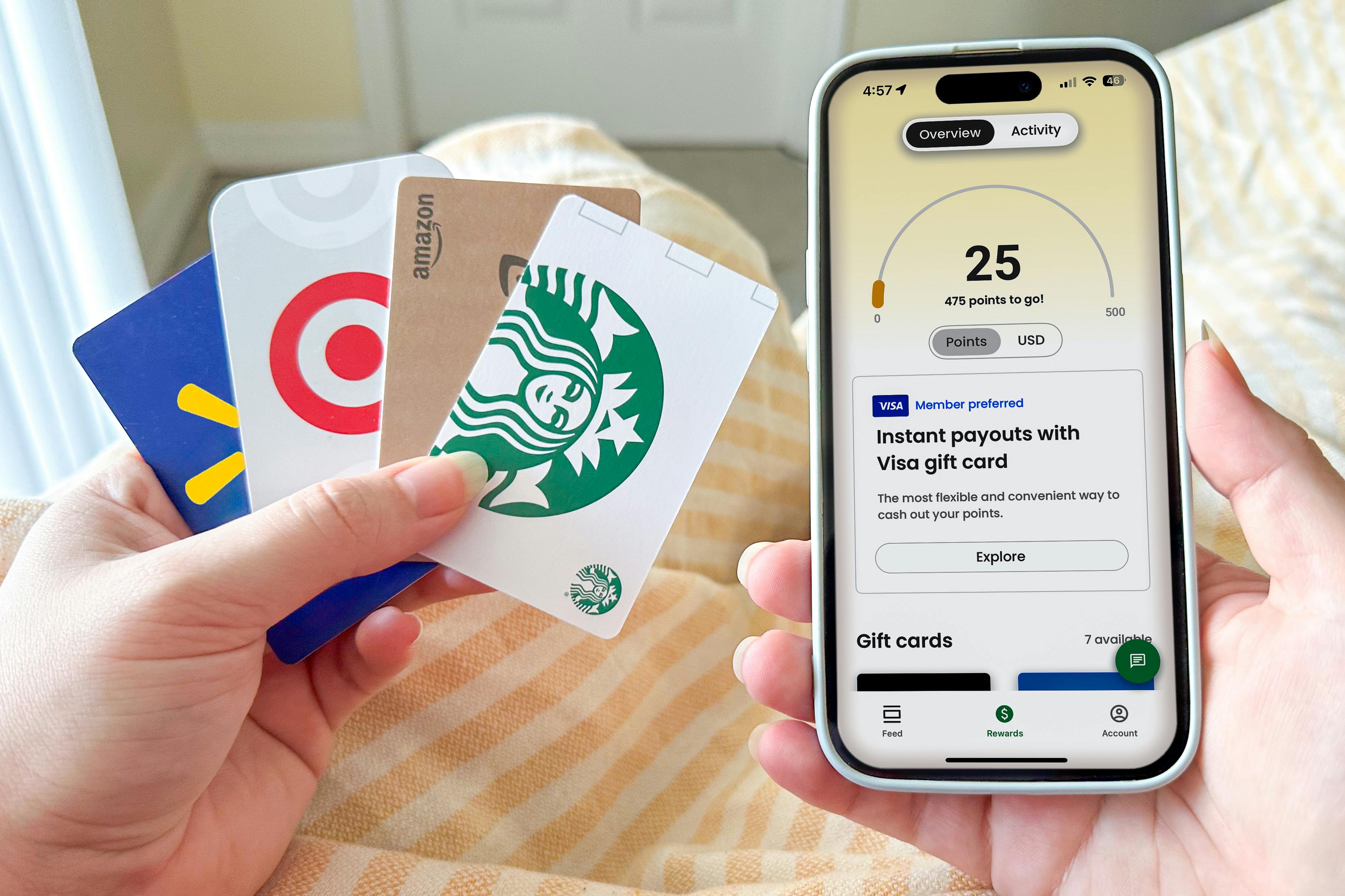 A woman fans out a stack of Starbucks gift cards