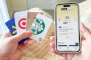 A woman fans out a stack of Starbucks gift cards