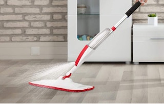 spray mop cleaning a floor