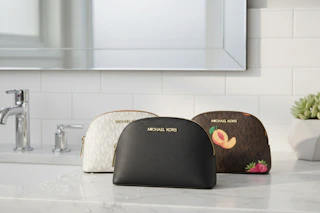 a michael kors travel pouch