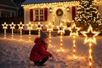 Star Solar Christmas Lights in front of house