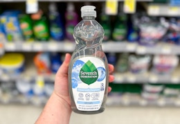 hand holding a bottle of seventh generation dish soap