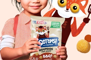 Stock image of a child holding a bag of Gerber Get'ems Puff Snacks