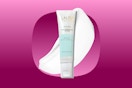 A 2-ounce bottle of Laura Geller Spackle Primer with a glob of primer behind it