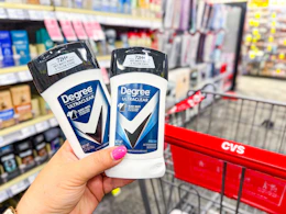 hand holding degree deodorants in cvs