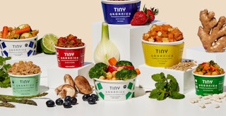 products from tiny organics with fruits and vegetables surrounding them