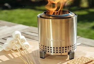 a silver metal tabletop Solo Stove firepit