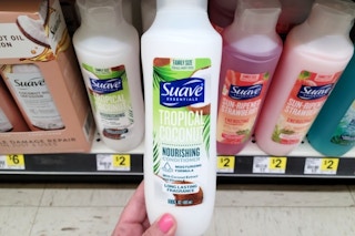 hand holding suave shampoo