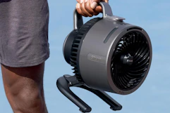 a shark rechargeable hydrogo fan being carried
