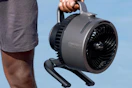 a shark rechargeable hydrogo fan being carried