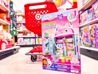 gabby's dollhouse interactive dollhouse sitting in front of a target cart