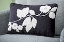Lifestyle image of the Beautiful Boucle Embroidered Chenille Floral Decorative Pillow by Drew Barrymore (from Walmart)