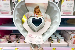 hand holding walmart paris hilton cake pan
