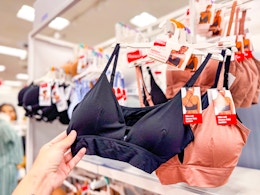 hand grabbing a hanes women's bra off a target shelf