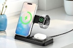 Lifestyle image of a wireless charging station being used to charge an iPhone and watch