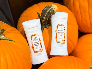 2 dove fall treats deodorants sitting on pumpkins at target