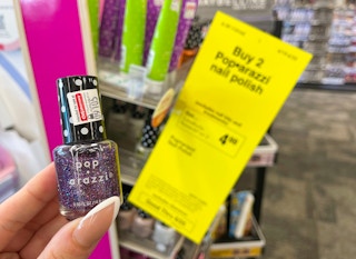 pop-arazzi nail polish held in hand