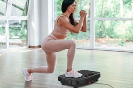 a woman using a vibration plate