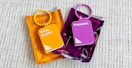 Two Chick-fil-A sauce keychains on a table