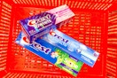 3 crest toothpastes in a red basket