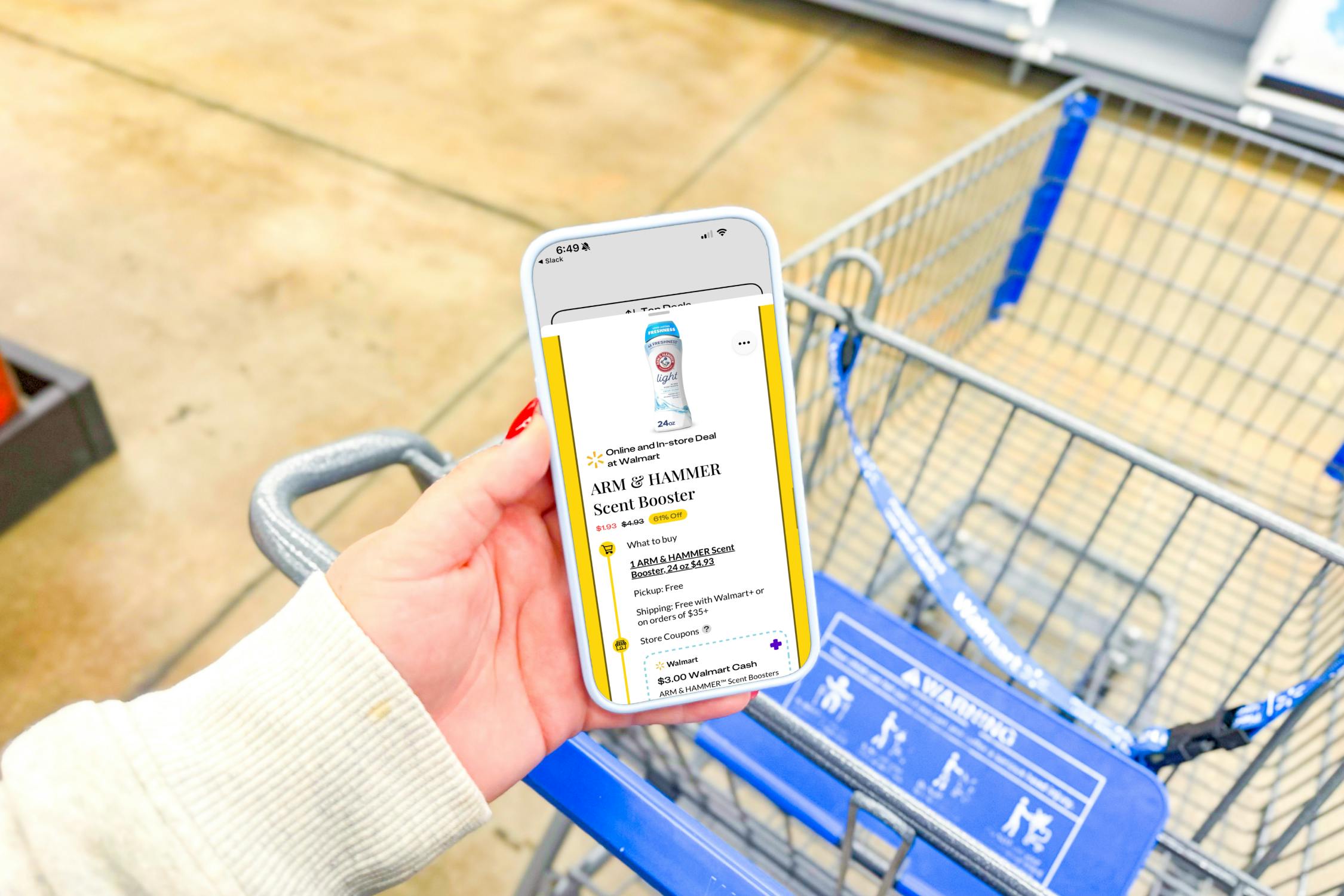 hand holding a smartphone displaying a 1-clip coupon deal