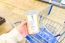hand holding a smartphone displaying a 1-clip coupon deal
