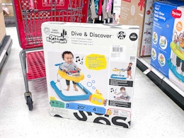 baby einstein baby walker sitting in front of a target cart