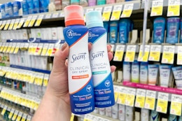 hand holding two clinical dry sprays
