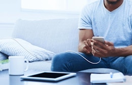 a person charging their phone