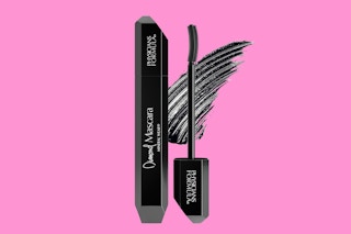 A tube of Physicans Formula Black Diamond Mascara on a pink background