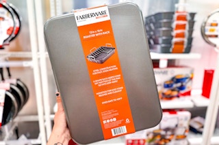 hand holding a farberware roaster pan at target