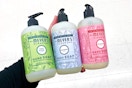 hand holding mrs meyers holiday hand soap