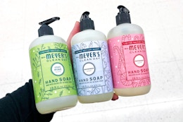 hand holding mrs meyers holiday hand soap
