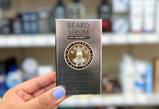 hand holding box of Beard Guyz beard serum