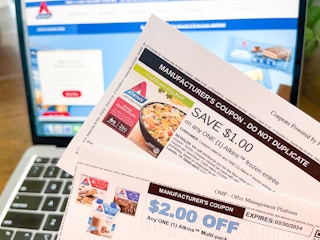 printed atkins coupon in front of computre