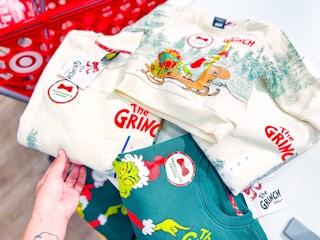 the grinch matching fleece sitting on a target shelf